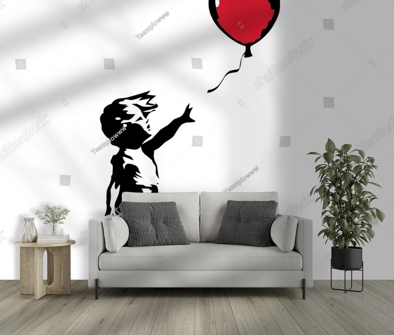 Chłopiec sięgający po czerwony balon w błękicie nieba