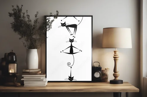 Elegancka sylwetka czarnych kotów w piramidzie