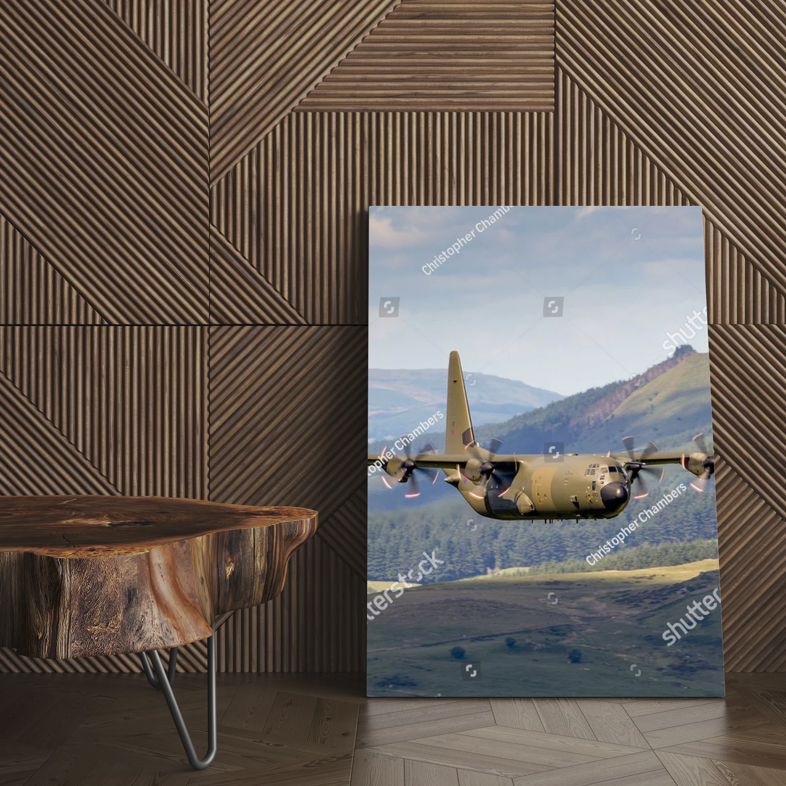 Zielony Lockheed C-130 Hercules nad malowniczym krajobrazem