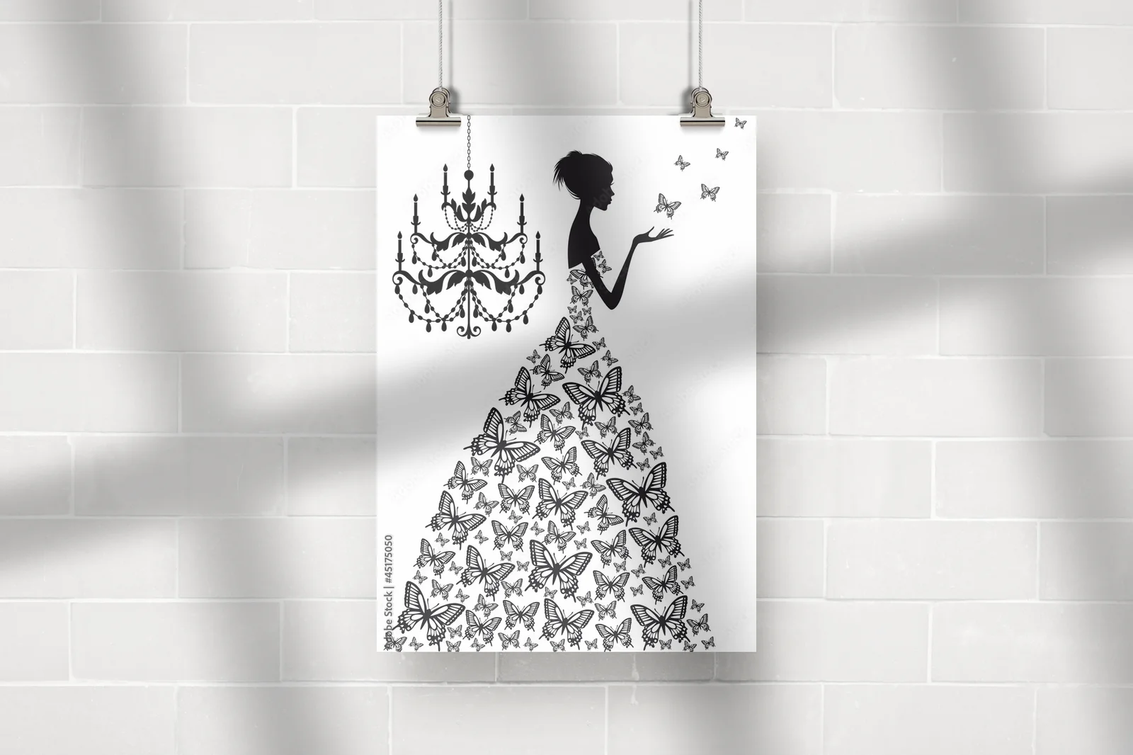 Elegancka kobieta z motylami w monochromatycznej kompozycji