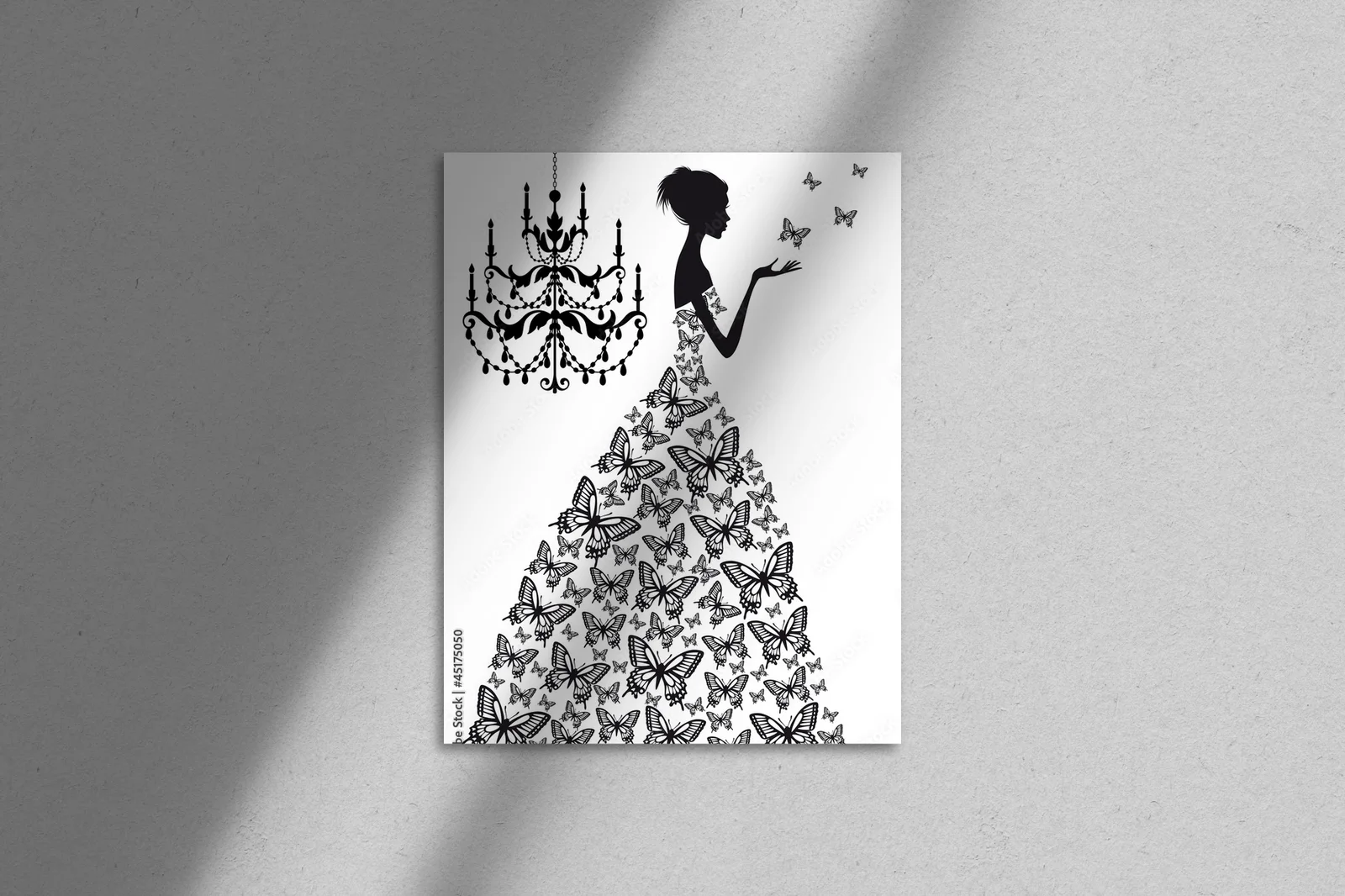Elegancka kobieta z motylami w monochromatycznej kompozycji