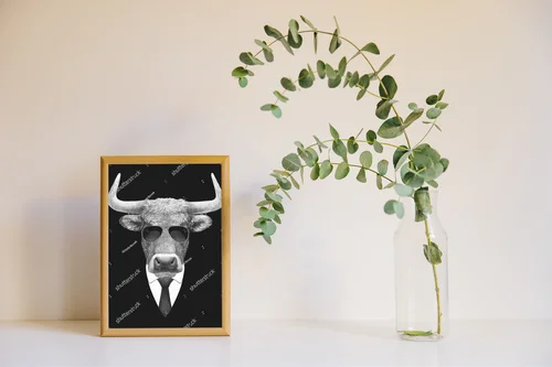 Elegancki byk w garniturze – ikona stylu
