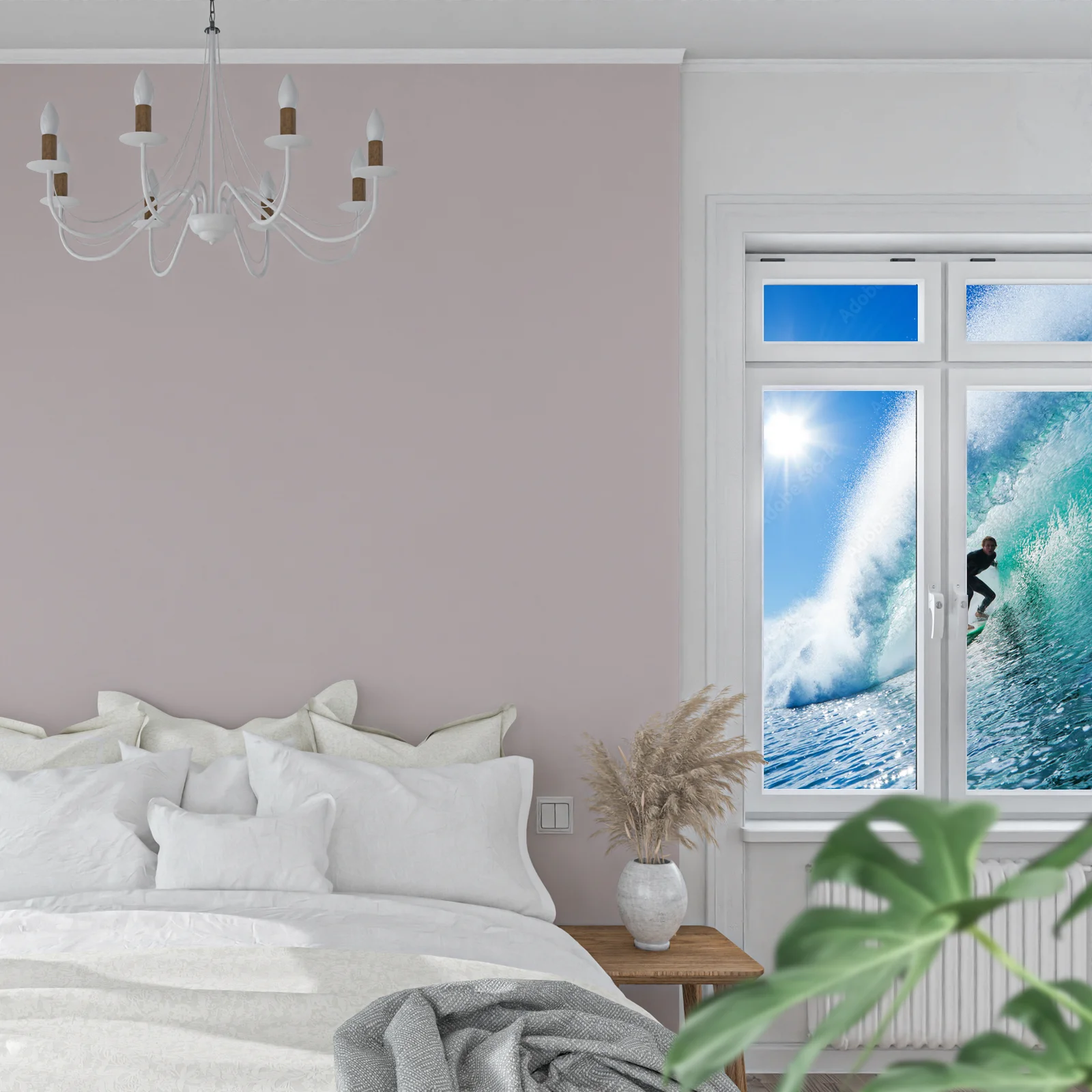 Pod niebem pełnym błękitu – surfer na oceanowej fali