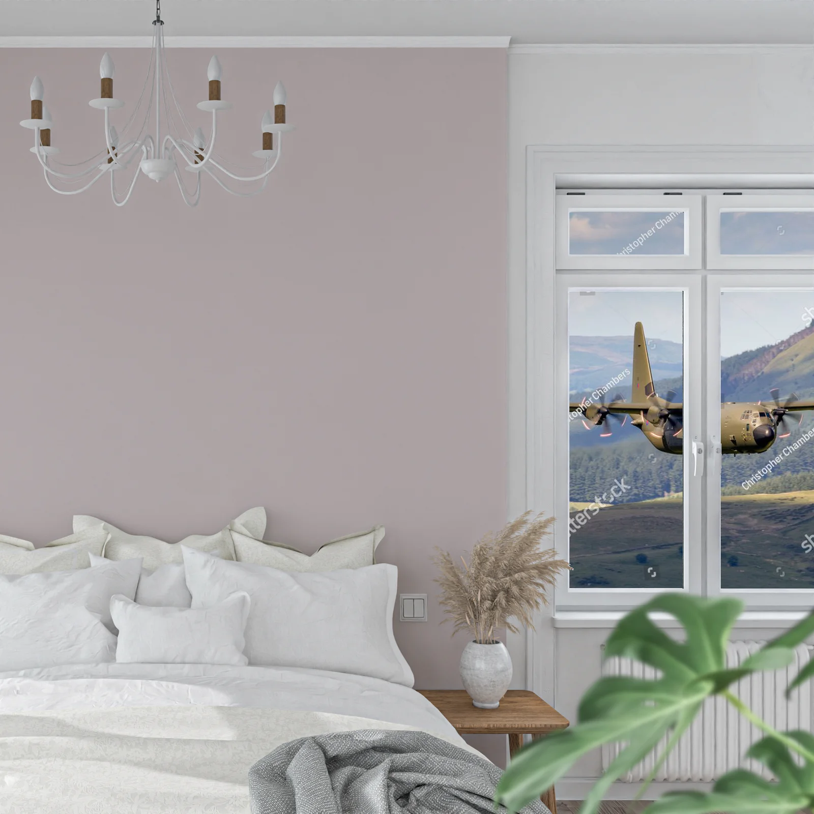 Zielony Lockheed C-130 Hercules nad malowniczym krajobrazem